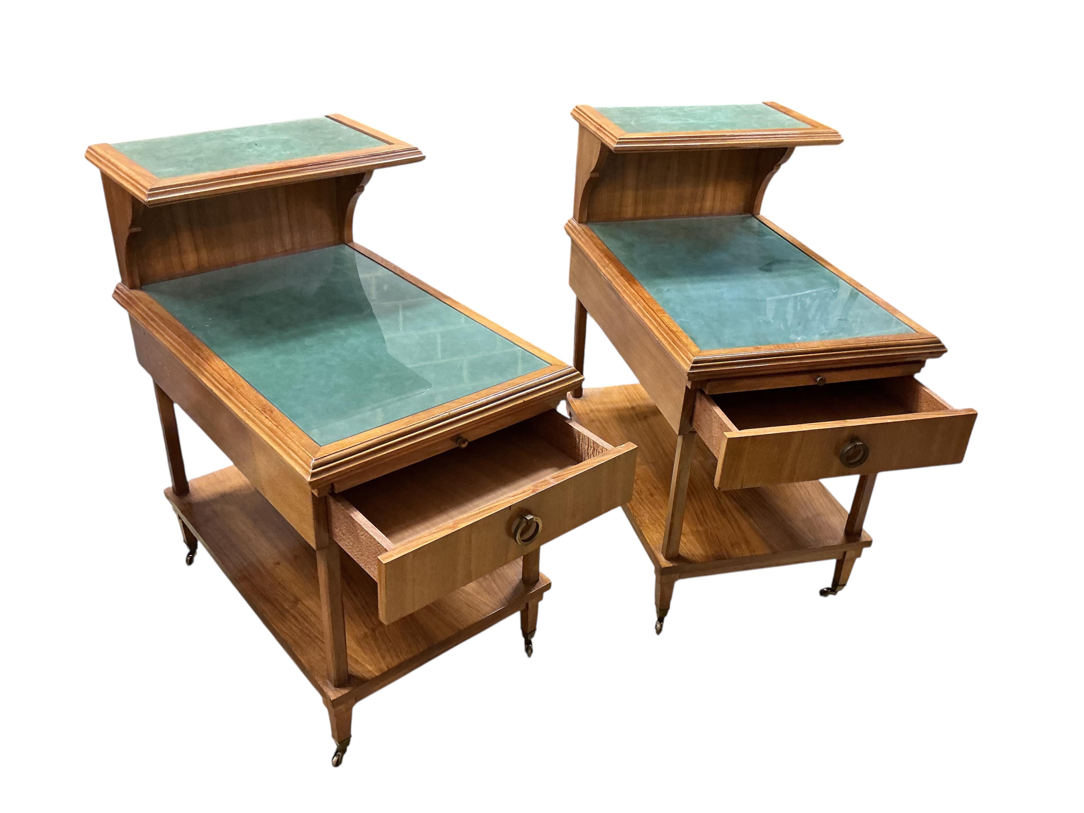 A pair of mid 20th century walnut bedside tables, width 46cm, depth 69cm, height 82cm